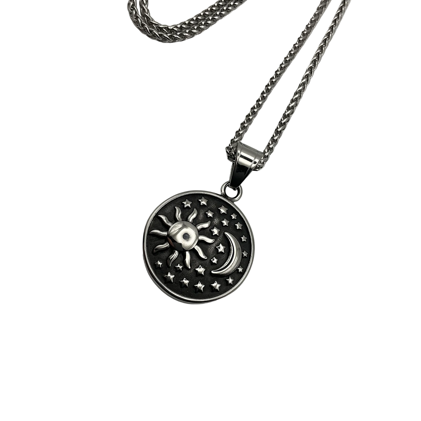 Stainless steel Talisman Necklace with a sun, moon, and star pendant on a white background