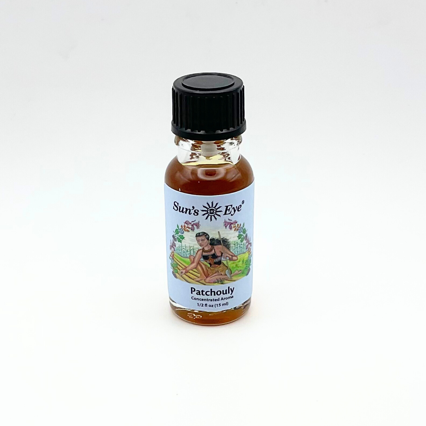Bottle of Sun's Eye Patchouli oil on a white background