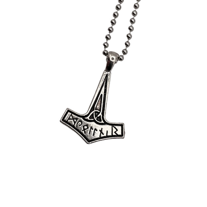Silver tone Thors Hammer Mjällnir necklace on a white background.
