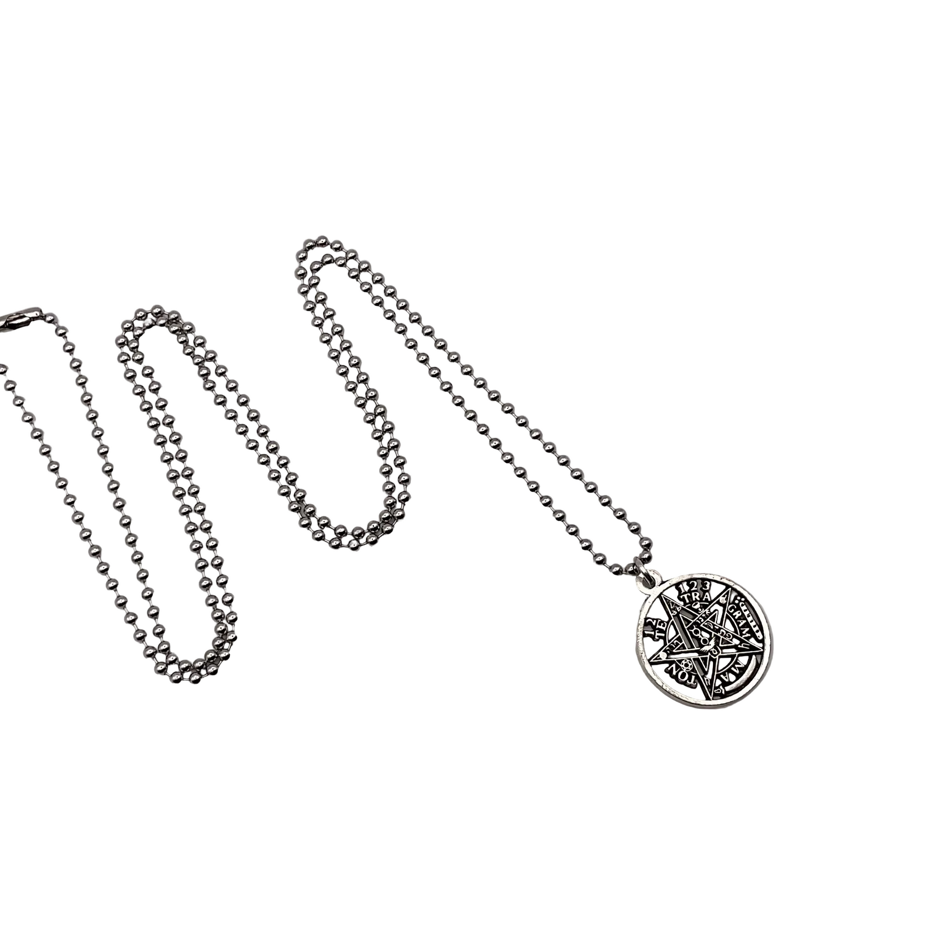 Silver tone pentacle charm necklace on a white background