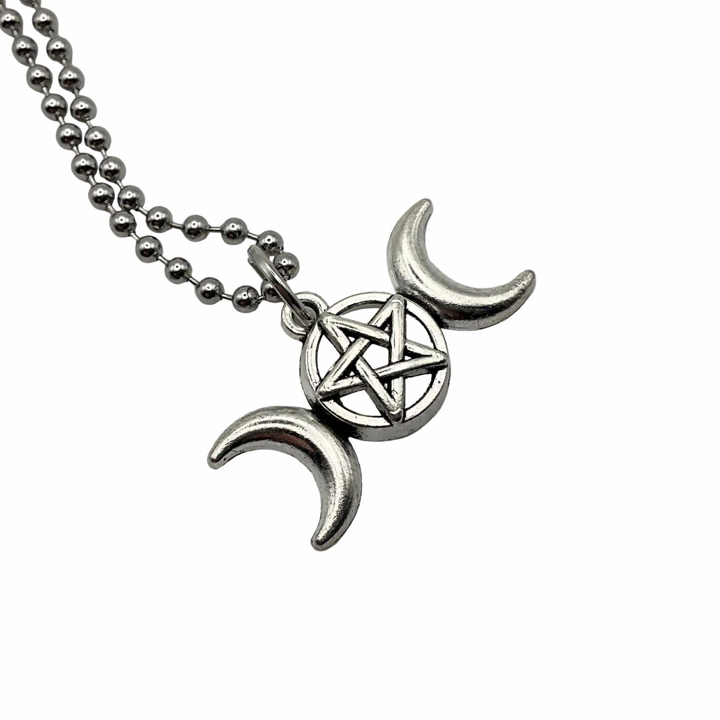 Silver tone Triple Goddess Lunar symbol charm with pentacle in the center on a silver tone ball chain displayed against a white background