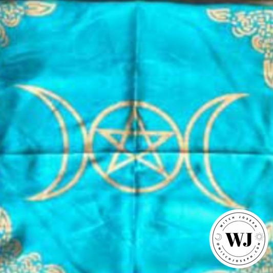 Turquoise fabric with gold pentagram and triple Goddess moon symbols, branded 'WJ'.