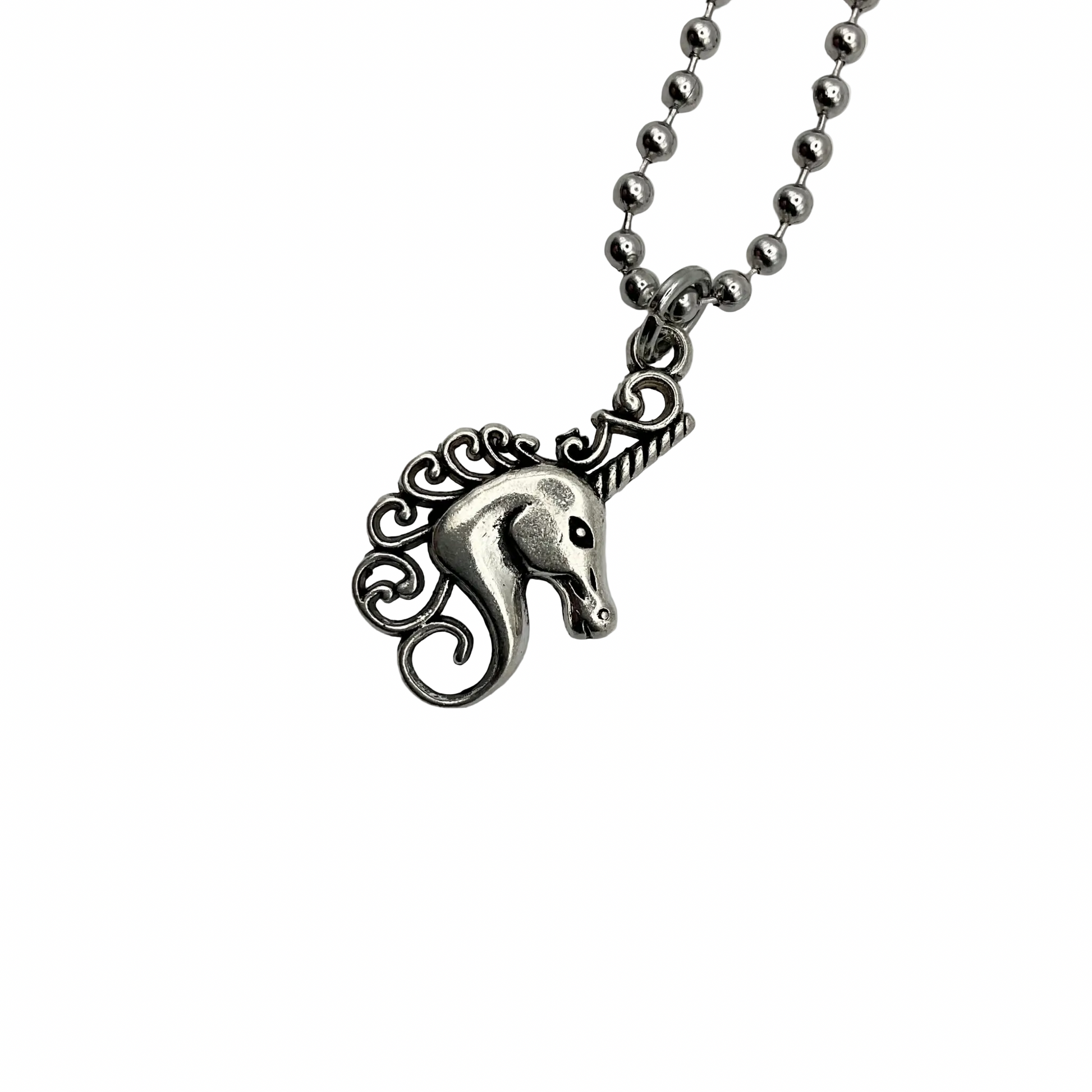 Silver tone bust of a unicorn pendant necklace on a white background