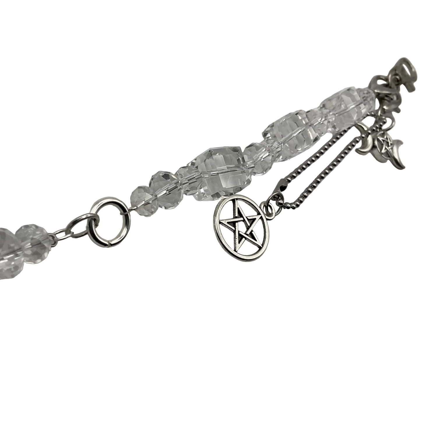 Bag charm with clear crystal beads and silver tone Pentacle and Triple Goddess charms on a light white background