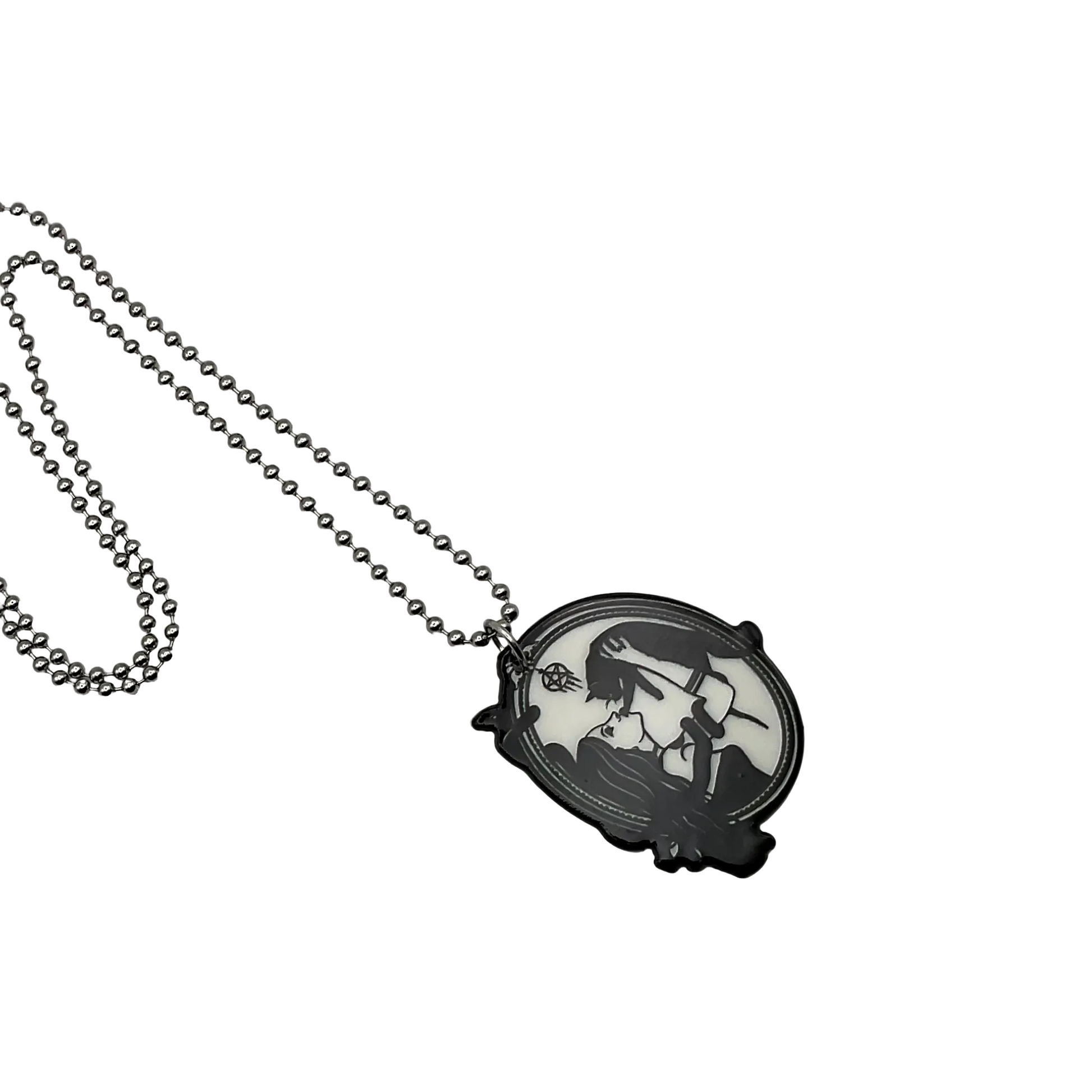 Necklace with a pendant featuring a silhouette design of a witch with black cat…and snake…on a white background