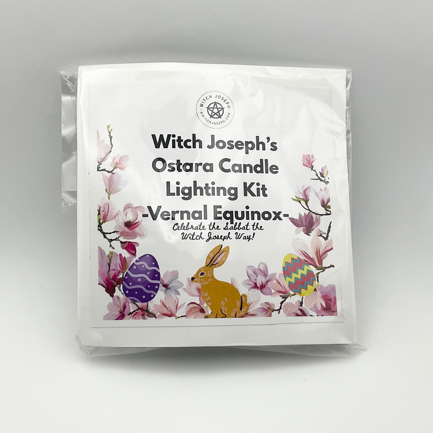 Witch Joseph's Ostara Candle Lighting Kit packaging with floral and bunny design on a gray background
