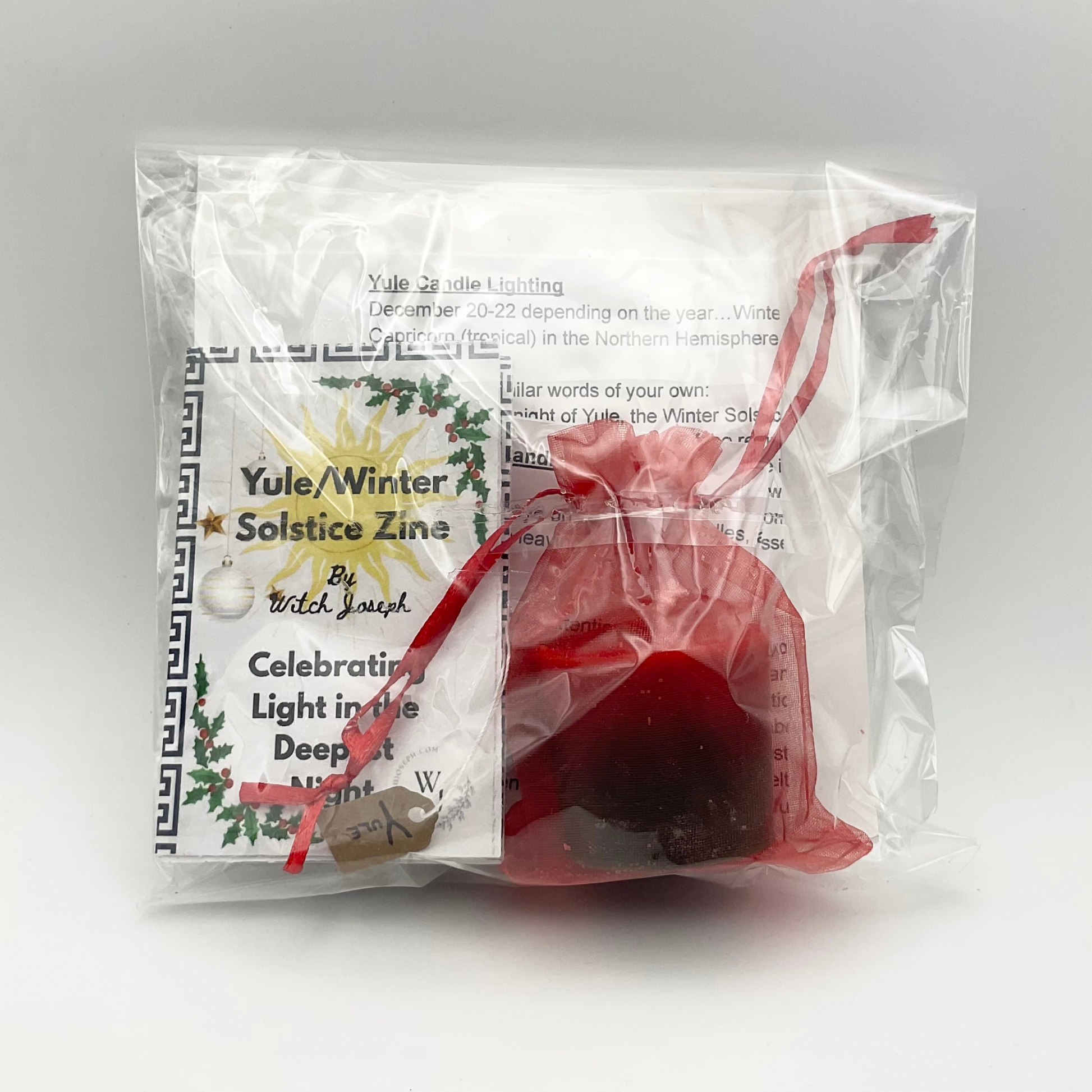 Witch Joseph Yule Candle Lighting Kit shown in transparent package from the back