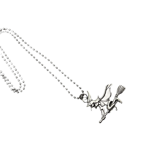 Necklace of a Witch on a broomstick pendant on a white background