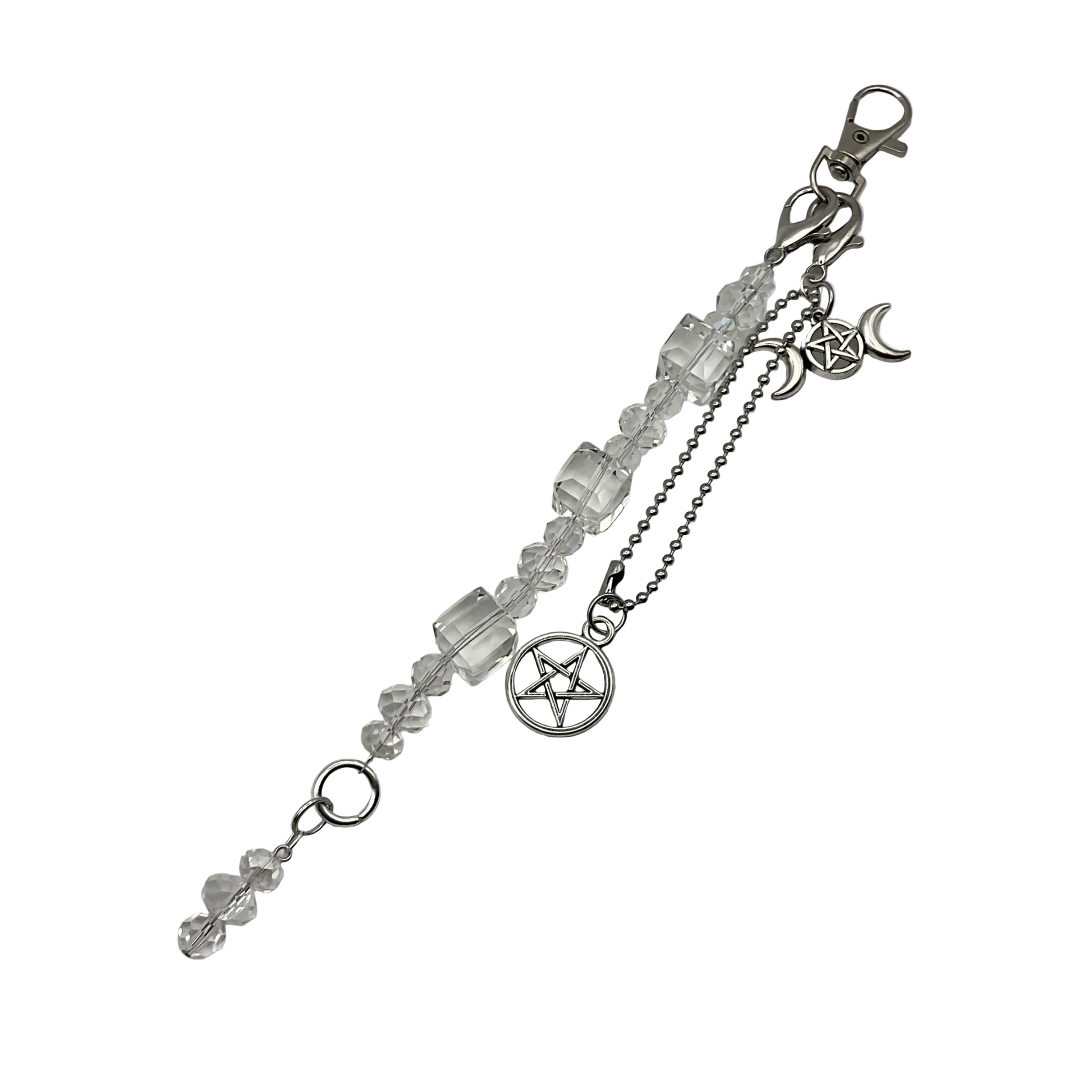 Silver bag charm  with crystal beads and pentacle and triple Goddess charms on a white background