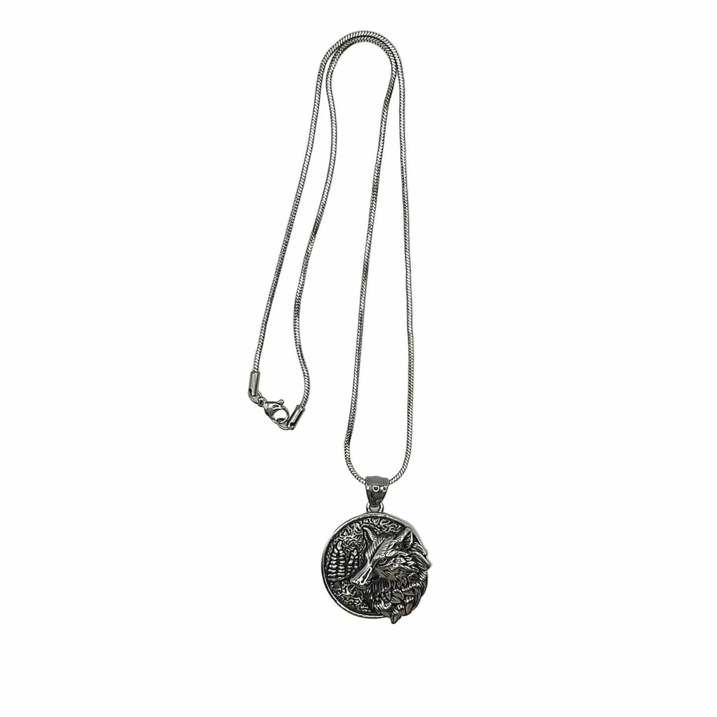 Silver tone necklace with a Wolf pendant on a white background