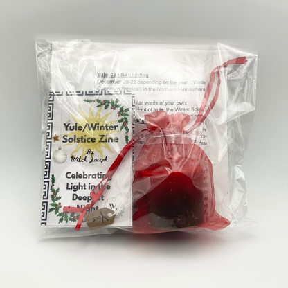 The Witch Joseph Yule Sabbat Candle it shown packaged from the reverse side…showing contents in package against a white background.